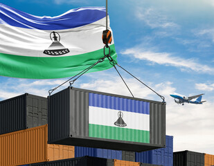 Flag of Lesotho and shipping container: A symbolic representation of international trade, the flag of Lesotho gracefully drapes above a shipping container adorned with the nation's colors.