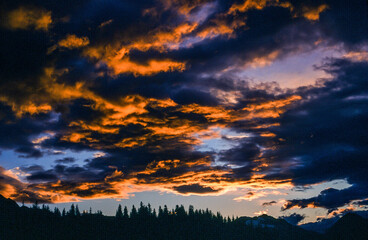 Fototapeta premium Dark clouds during sunset