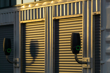 Dual Electric Vehicle EV Charging Stations on Corrugated Metal Storage Units