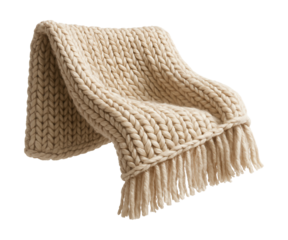 Chunky knit decorative throw blanket, perfect for draping over a living room sofa.