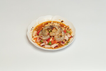 Green papaya salad Thai cuisine spicy delicious. Thai call "SOM TAM". Famous Thai food, papaya salad, Somtum, Papaya Pok Pok. Closeup Thai Green Papaya Salad with peanuts.