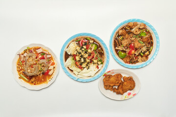 Green papaya salad Thai cuisine spicy delicious. Thai call "SOM TAM". Famous Thai food, papaya salad, Somtum, Papaya Pok Pok. Closeup Thai Green Papaya Salad with peanuts.