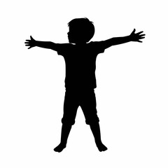 Silhouette of a young boy with arms outstretched wide.