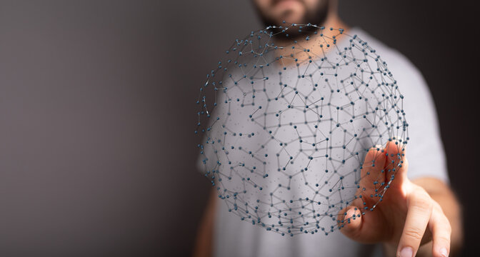 Abstract image of a person touching a digital network sphere. Symbolizing global connection, communication, and technological advancement. Ideal