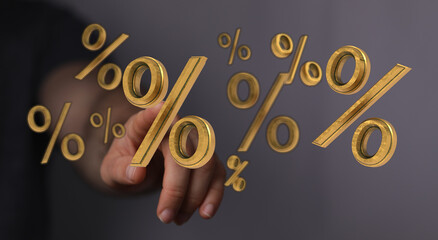 Image of golden percent symbols floating in front of a hand, perfect for finance, sales, discounts, and investment concepts.