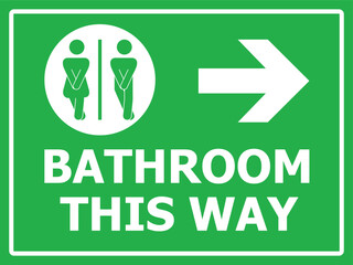 Green toilet sign with directional arrows and Bathroom This Way