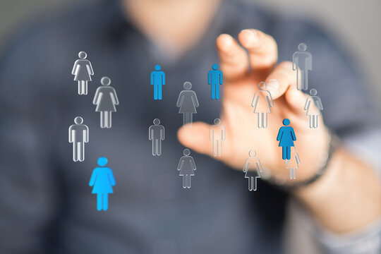 Abstract image representing a recruitment or hiring concept, hand selecting a woman figure, human resources, ch