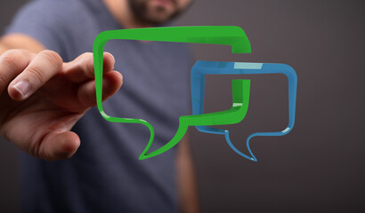 A person interacts with colorful 3D chat bubbles, symbolizing online conversations, digital...