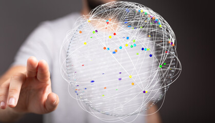 Abstract image of a person interacting with a network or internet globe, symbolizing global connection, data transfer and innovation.