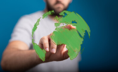 Eco-friendly concept. Sustainable future. Global network. Hand touching digital earth.