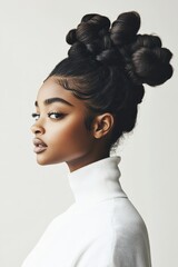 Beautiful woman with elaborate coily hair styled high. She wears a soft white turtleneck, gazing calmly in profile. Natural black hair, elegant posture.