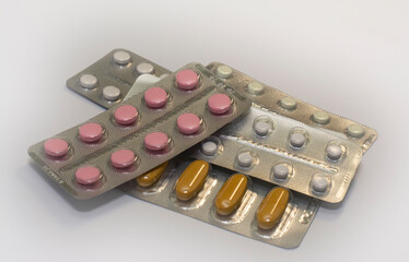 The photo shows many pills in blister packs.