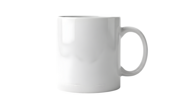 A simple white ceramic mug with a c shaped handle isolated on a black background studio shot