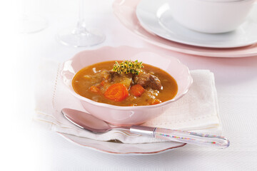 Homemade pork stew with seasonal vegetables and carrots.