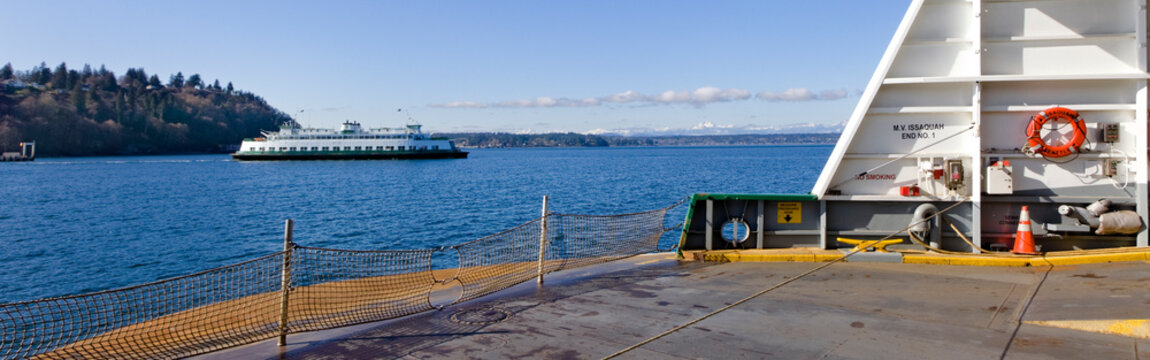 The M.V. Issaquah Ferry boat en route to Vashon Island, offshore on a sunny winter day.