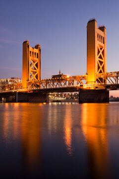 Tower Bridge at sunset, crossing bridge over the Sacramento River 
