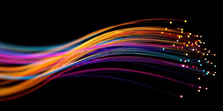 Vibrant light trails create a dynamic flow in a mesmerizing abstract display against a dark background - Powered by Adobe