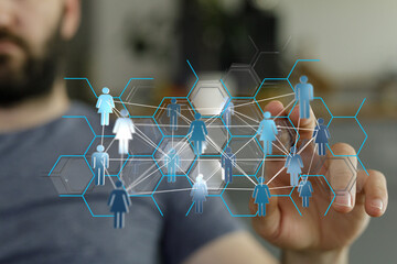 Man touching interactive interface representing social network, global communication and people connections. Bu