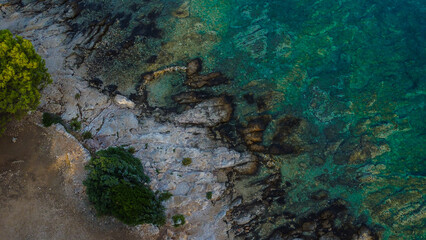 Rocky coastline and the mesmerizingly clear turquoise waters of the sea