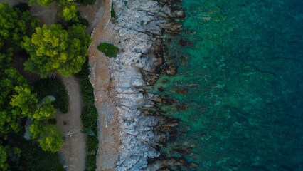 Seaside urban landscape: Dense residential buildings and tourist facilities lining the Mediterranean shoreline