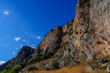 Limestone cliffs under deep Mediterranean blue sky