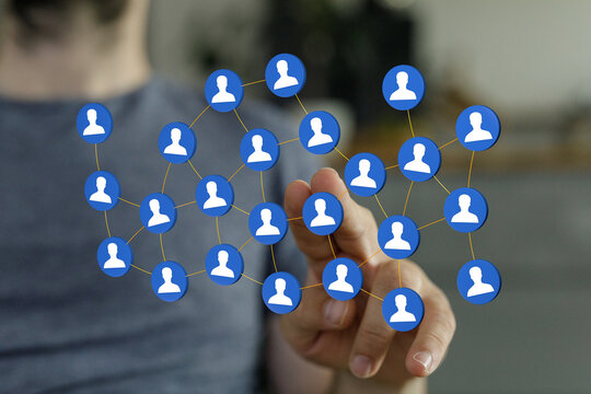 Concept of social network and global connections using technology and hand-touching interface. Teamwork, commun