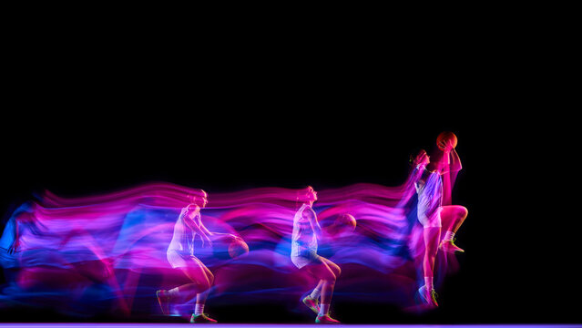 Multi-exposure of basketball player shooting ball in pink neon. Concept of motion analysis, digital sports branding, coaching materials, and fitness advertising visuals.