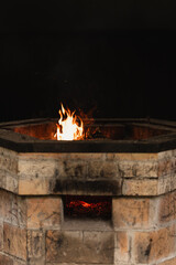 Fireplace with burning fire