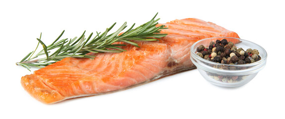 Piece of tasty grilled salmon, peppercorns and rosemary isolated on white