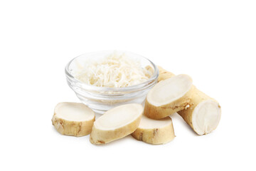 Grated horseradish and cut root isolated on white