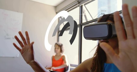 Woman putting on VR headset and manipulating concentric rings, refining gestures for tech test