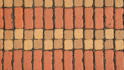 Close up of a colorful brick paving pattern