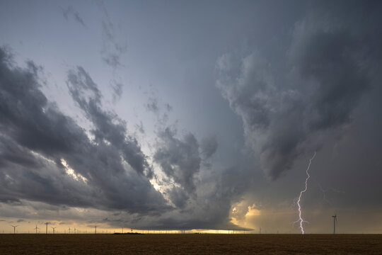 Cloud to ground lightning from a new Supercell stalled against an Outflow Boundary, weather effects. 