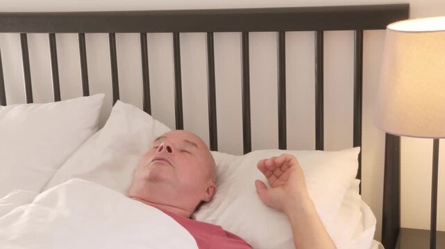 senior man rests deeply, eyes closed and face serene, Nighttime struggles, sleep disruption, anxiety in older adult, quiet moment true rest, reminding healing begins body finally surrenders to sleep