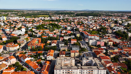 Aerial Drone View of Pula, Croatia on a Bright Sunny Day. Stunning coastal cityscape, historic architecture, turquoise Adriatic Sea and vibrant Mediterranean landscapes captured from above