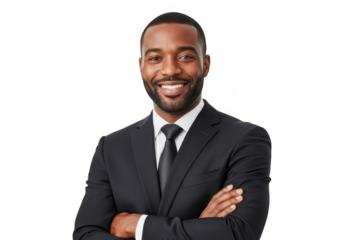 Smiling african american businessman in a sharp black suit and tie with arms crossed confidently against a stark black background