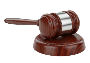 A polished wooden judge s gavel rests on its matching sound block against a stark black background symbolizing justice and legal proceedings