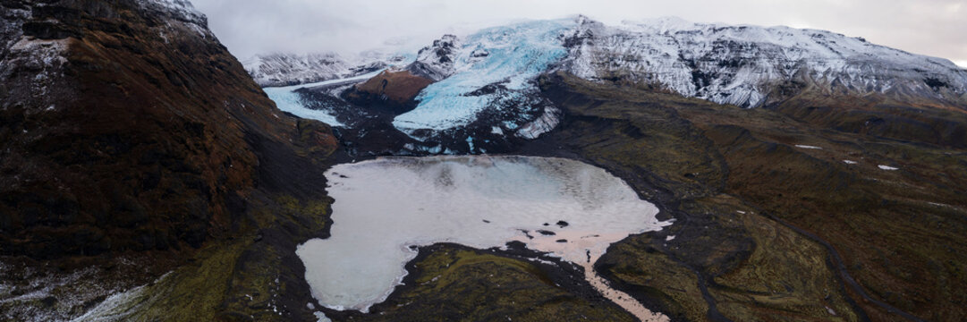Fallj&ouml;kull Glacier, elevated view of the glacier flowing out of the vast Vatnaj&ouml;kull ice cap and glacier, called the Falling Glacier with a lagoon below. 