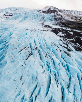 Overhead View of Falljokul Glacier, the frozen outlet of the vast Vatnaj&ouml;kull ice cap, ridges of blue ice. 