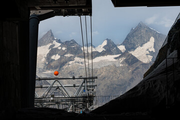 Glacial Paradise cable car in Zermatt, with the Swiss Alps stretching into the background under a clear alpine sky in the border of Italy and Switzerland