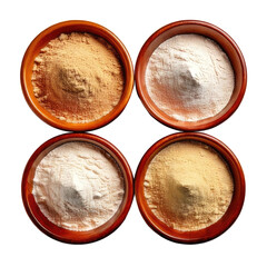 Four ceramic bowls with different colored powders