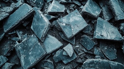 A close-up view of a pile of broken concrete debris at a construction site