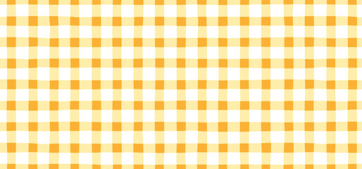  Yellow Vichy checkered seamless pattern in cute childish style. Vector tartan picnic fabric texture for textile design, packaging, wrapping paper, baby clothes, tablecloths, and summer-themed prints
