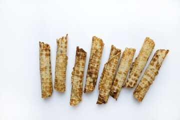 Wafer crispy sticks isolated on a white background, top view