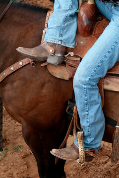 Gallup, New Mexico, United States. Annual Gallup Intertribal Ceremonies. Indian cowboy takes a break.
