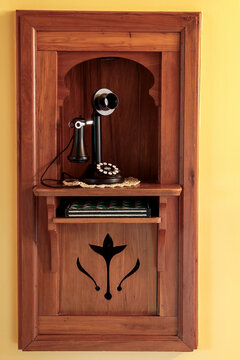 Dimitt, Texas, USA. Old  dial up telephone housed in a niche from the 1920's 