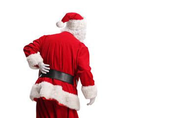 Fototapeta premium Rear view shot of Santa Claus with backpain