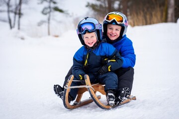 Two Boys Enjoying a Winter Sledding Adventure in the Snow