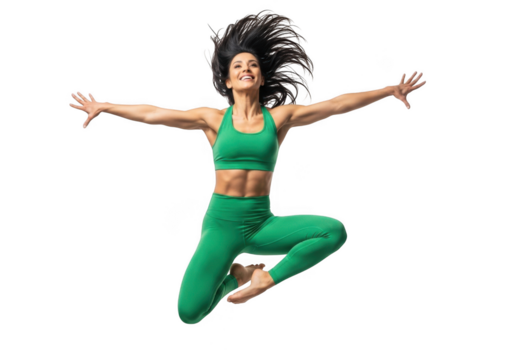 Athletic woman in green activewear performing a dynamic leap with arms extended and legs bent isolated on transparent background