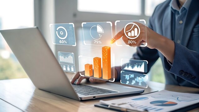 Business professional interacting with holographic financial data and charts on a laptop